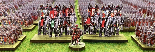 Tabletop miniature battle depicting the siege of Alesia with Gallic forces under Vercingetorix confronting Roman troops led by Julius Caesar
