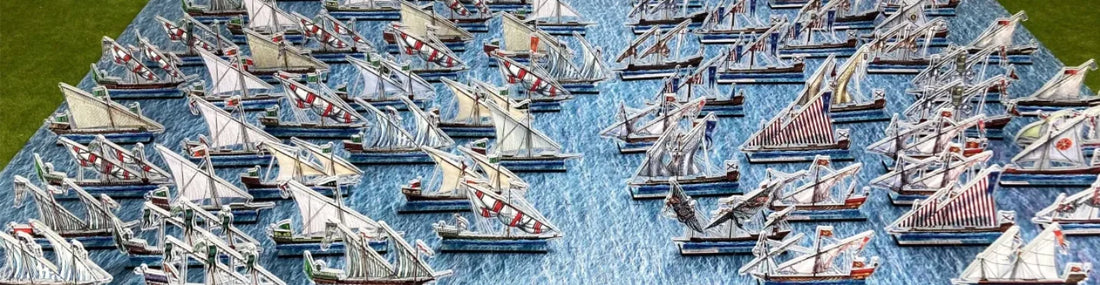 Historical naval wargaming fleets from the Battle of Lepanto to Tsushima with detailed miniature warships on the tabletop battlefield