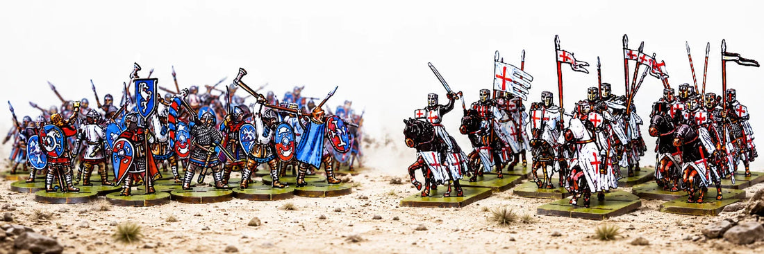 Skirmish fighters face a massed medieval army on a tabletop battlefield