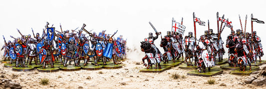 Skirmish fighters face a massed medieval army on a tabletop battlefield